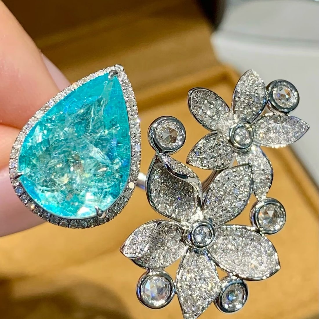 14k Gold 6.85 Ct Natural Paraiba Tourmaline & Diamond Ring: Ref:231193199 // gold content:14k gold // ring size:7. 25us // // main gemstone:paraiba tourmaline // shape:pear // carat weight:6. 85ct // color:blue // treatment:natural // // adjacent gemstone 2 : 