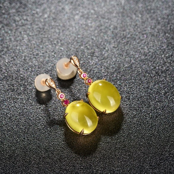 14k Gold 9.63 Ct Natural Prehnite & Diamond & Ruby Earrings: Ref:231193202 // gold content:14k gold // main gemstone:prehnite // shape:oval // carat weight:9. 63ct // color:yellow // treatment:natural // // adjacent gemstone 2 : diamond // number of stones:6 //