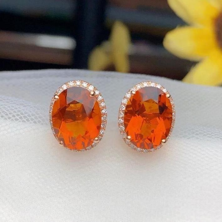 14k Gold 4.00 Ct Natural Citrine & Diamond Earrings: Ref:231193252 // gold content:14k gold // main gemstone:citrine // shape:oval // carat weight:4. 00ct // color:yellow // treatment:natural // // adjacent gemstone 2 : diamond // number of stones:54 //