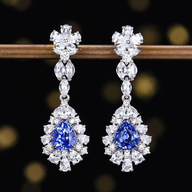 14k Gold 1.58 Ct Natural Sapphire & Sapphire & Diamond Earrings: Ref:231194028 // gold content:14k gold // main gemstone:sapphire // shape:pear // carat weight:1. 58ct // color:blue // treatment:natural // // adjacent gemstone 2 : sapphire // shape:multiple // colo