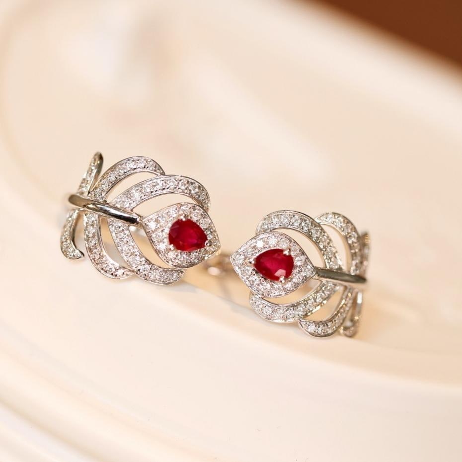 14k Gold 0.68 Ctw Vivid Red Natural Ruby & Diamond Earrings: Ref:231194034 // gold content:14k gold // main gemstone:ruby // shape:pear // carat weight:0. 3ct // color:vivid red // treatment:natural // // adjacent gemstone 2 : diamond // shape:round // carat