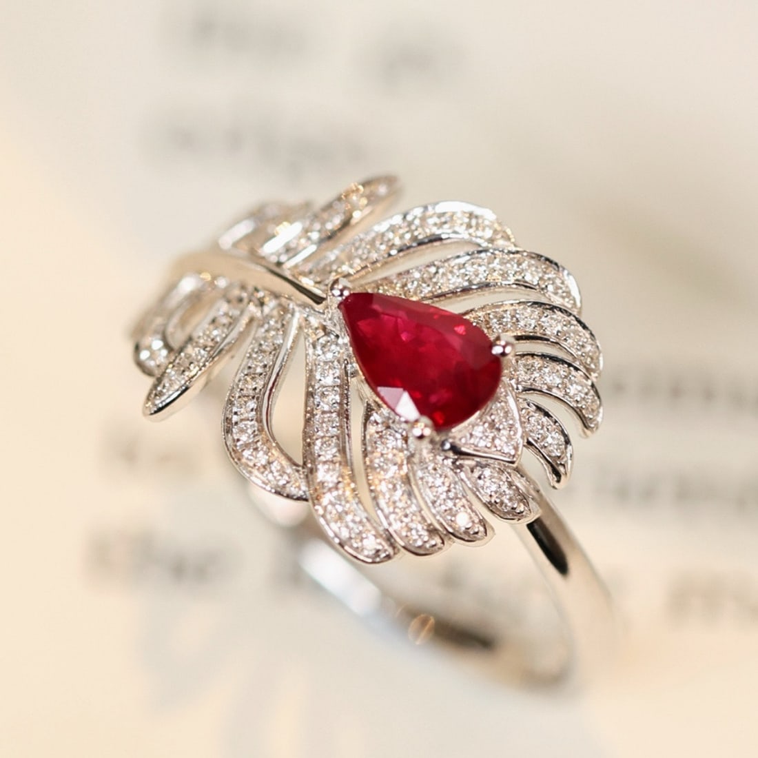 14k Gold 0.63 Ctw Vivid Red Natural Ruby & Diamond Ring: Ref:231194035 // gold content:14k gold // ring size:7. 25us // // main gemstone:ruby // shape:pear // carat weight:0. 44ct // color:vivid red // treatment:natural // // adjacent gemstone 2 : diamond