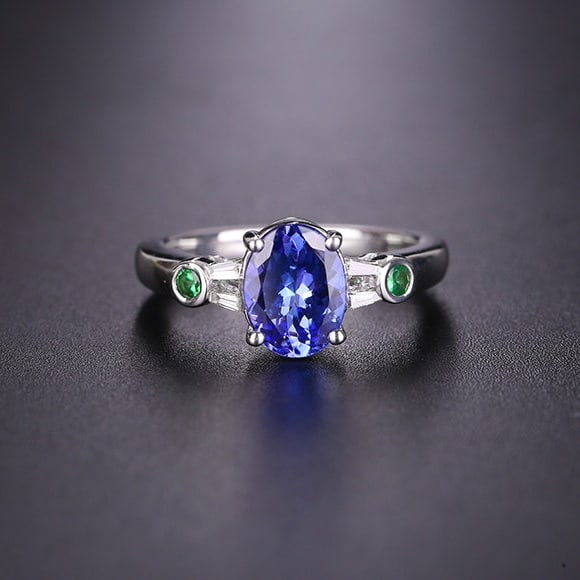 14k Gold 1.51 Ctw Natural Tanzanite & Diamond Ring: Ref:231194056 // gold content:14k gold // ring size:7. 25us // // main gemstone:tanzanite // shape:oval // carat weight:1. 45ct // color:blue // treatment:natural // // adjacent gemstone 2 : diamond