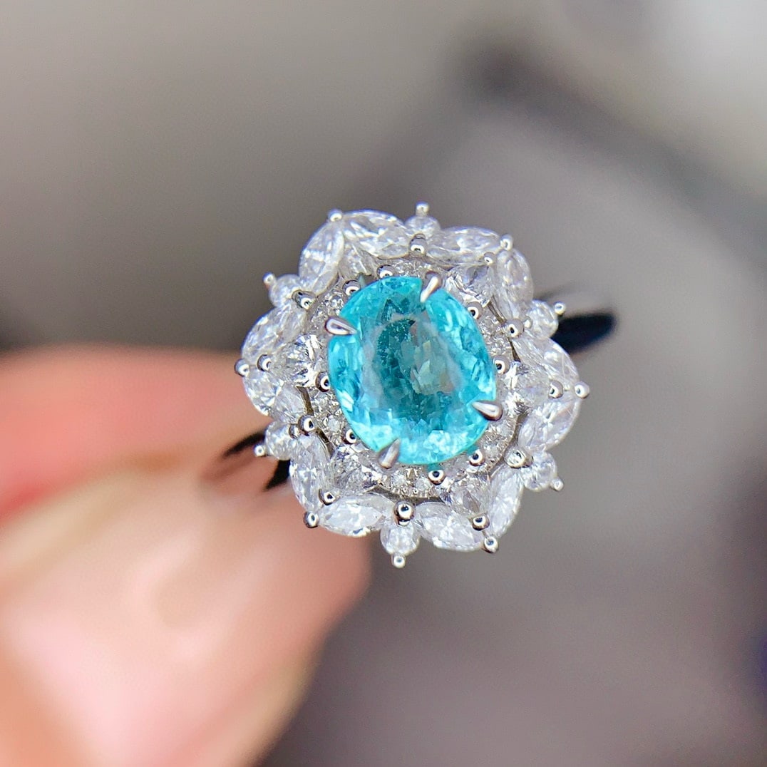 14k Gold 0.74 Ct Natural Paraiba Tourmaline & Diamond Ring: Ref:231194063 // gold content:14k gold // ring size:7. 25us // // main gemstone:paraiba tourmaline // shape:oval // carat weight:0. 74ct // color:blue // treatment:natural // // adjacent gemstone 2 : 
