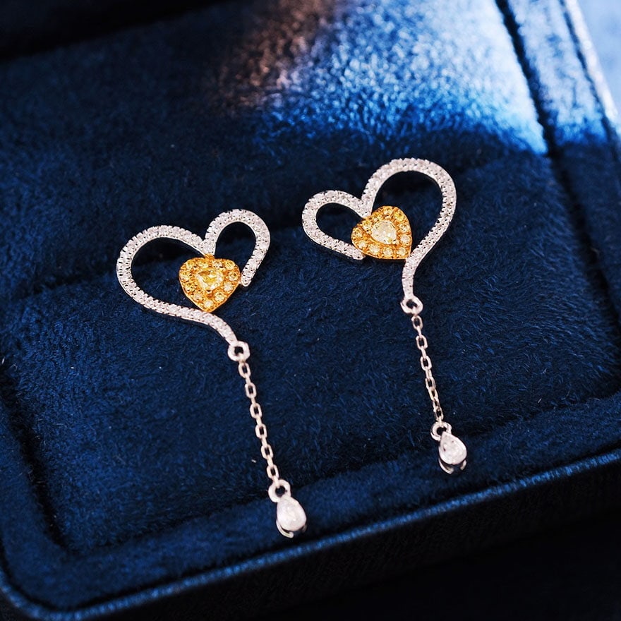 14k Gold 0.6 Ct Natural Color Diamond Earrings: Ref:231194087 // gold content:14k gold // main gemstone:diamond // shape:multiple // carat weight:0. 6ct // clarity grade:vs-si // color:color // treatment:natural // Condition: New Low Estimate: 3300