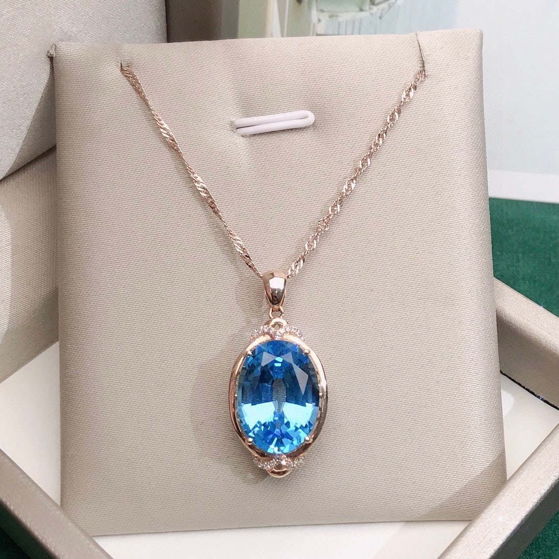 14k Gold 9.75 Ctw Natural Topaz & Diamond Pendant( Without Chain ): Ref:231194096 // gold content:14k gold // main gemstone:topaz // shape:oval // carat weight:9. 7ct // color:blue // treatment:natural // // adjacent gemstone 2 : diamond // number of stones:18 //