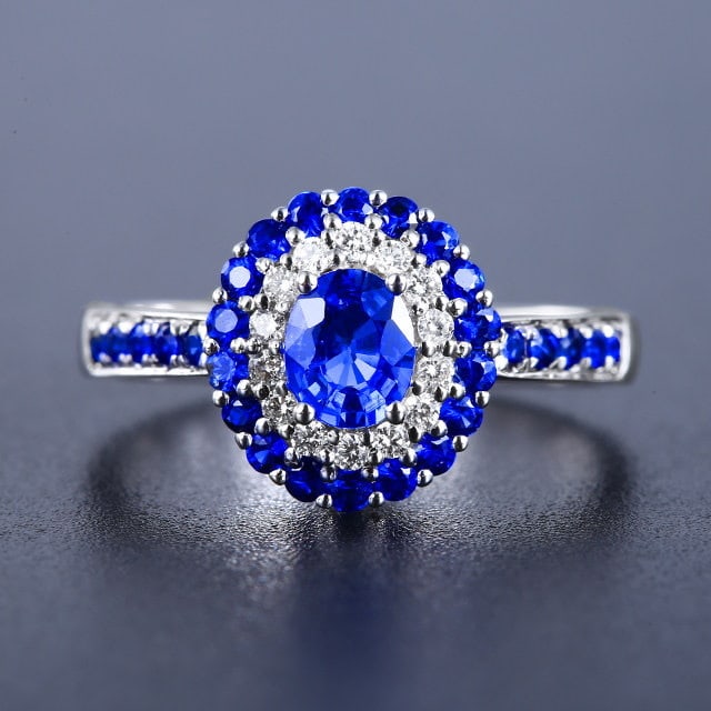 14k Gold 0.97 Ctw Natural Sapphire & Sapphire Ring: Ref:231194121 // gold content:14k gold // ring size:7. 25us // // main gemstone:sapphire // shape:oval // carat weight:0. 55ct // color:blue // treatment:natural // // adjacent gemstone 2 : sapphire /