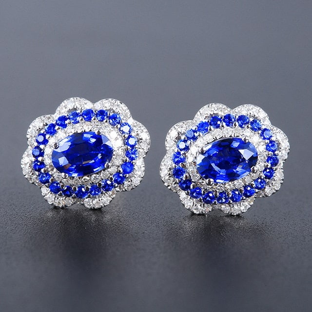 14k Gold 1.50 Ctw Natural Sapphire & Sapphire Earrings: Ref:231194122 // gold content:14k gold // main gemstone:sapphire // shape:oval // carat weight:1. 09ct // color:blue // treatment:natural // // adjacent gemstone 2 : sapphire // shape:round // carat w