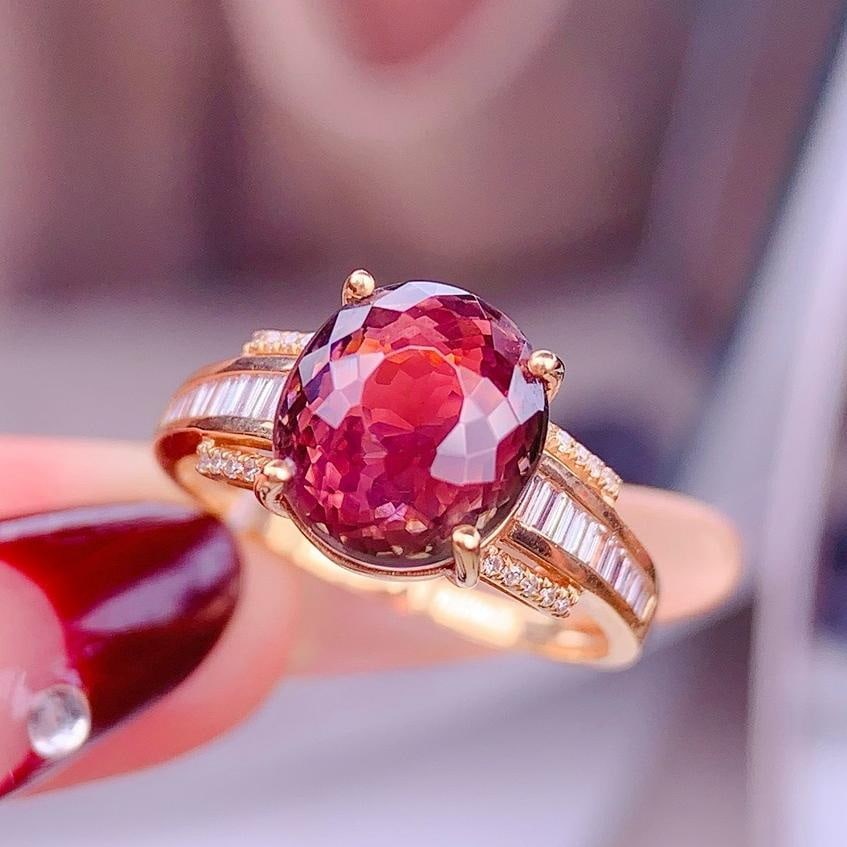 14k Gold 4.5 Ct Natural Tourmaline & Diamond Ring: Ref:231194147 // gold content:14k gold // ring size:7. 25us // // main gemstone:tourmaline // shape:oval // carat weight:4. 5ct // color:red // treatment:natural // // adjacent gemstone 2 : diamond
