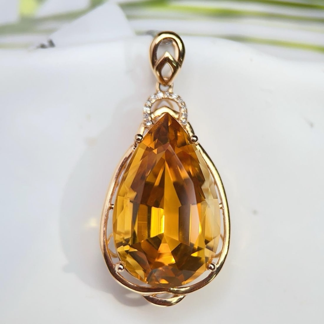 14k Gold 14.43 Ctw Natural Citrine & Diamond Pendant( Without Chain ): Ref:231194152 // gold content:14k gold // main gemstone:citrine // shape:pear // carat weight:14. 4ct // color:yellow // treatment:natural // // adjacent gemstone 2 : diamond // number of stones:12 //
