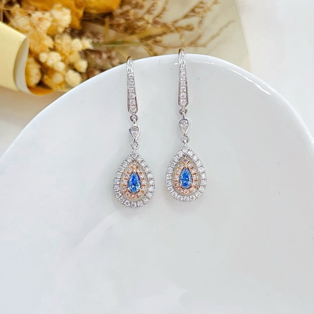 14k Gold 0.62 Ctw Natural Blue Diamond & Diamond Earrings: Ref:231194173 // gold content:14k gold // main gemstone:blue diamond // shape:pear // carat weight:0. 16ct // color:blue // treatment:natural // // adjacent gemstone 2 : diamond // shape:round // cara