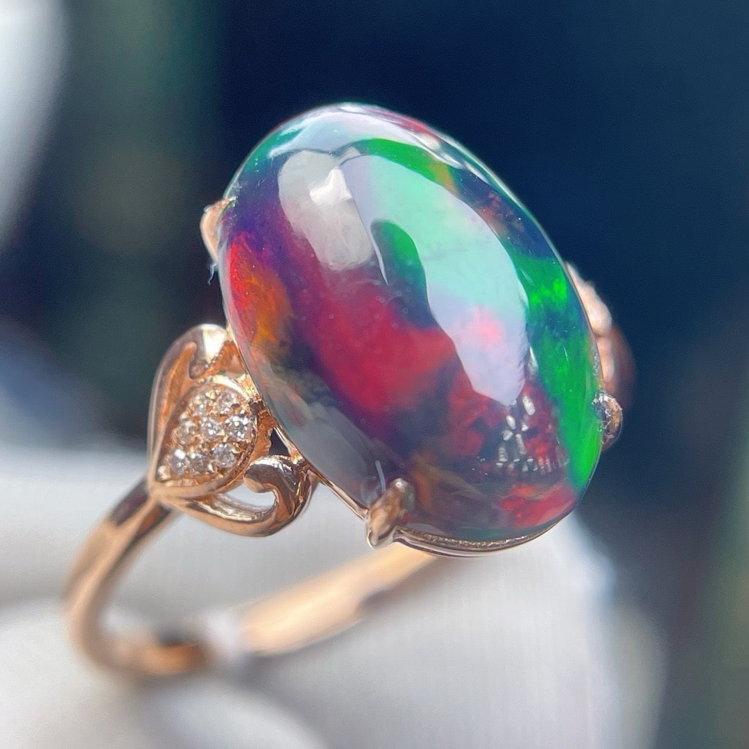 14k Gold 4.7 Ct Natural Opal & Diamond Ring: Ref:231194206 // gold content:14k gold // ring size:7. 25us // // main gemstone:opal // shape:oval // carat weight:4. 7ct // color:color // treatment:natural // // adjacent gemstone 2 : diamond // sha