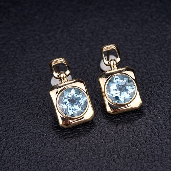 14k Gold 3.71 Ct Natural Aquamarine Earrings: Ref:231194229 // gold content:14k gold // main gemstone:aquamarine // shape:round // carat weight:3. 71ct // color:blue // treatment:natural // cut grade:g // High Estimate: 5300 Low Estimate: 3500