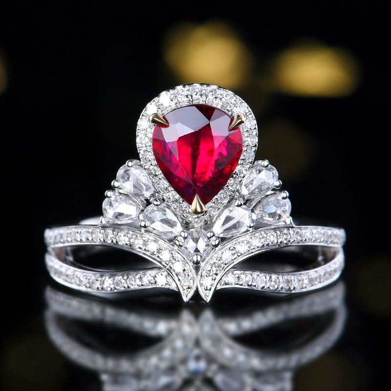 14k Gold 1.22 Ctw Natural Ruby & Diamond Ring: Ref:231194234 // gold content:14k gold // ring size:7. 25us // // main gemstone:ruby // shape:pear // carat weight:0. 8ct // color:pigeonblood red // treatment:natural // // adjacent gemstone 2 : diam