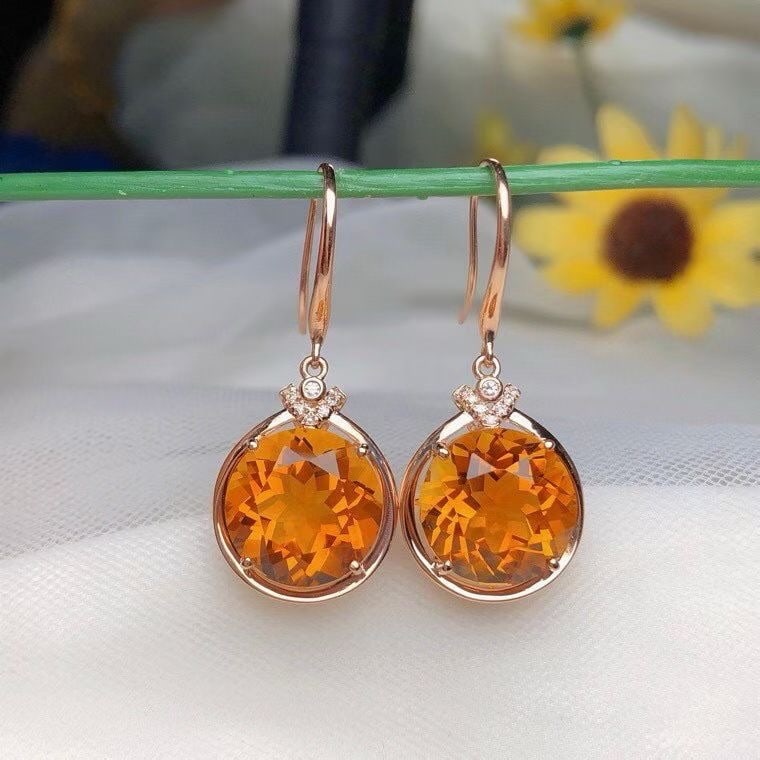 14k Gold 10.35 Ct Natural Citrine & Diamond Earrings: Ref:231194375 // gold content:14k gold // main gemstone:citrine // shape:round // carat weight:10. 35ct // color:yellow // treatment:natural // cut grade:g // // adjacent gemstone 2 : diamond // numbe