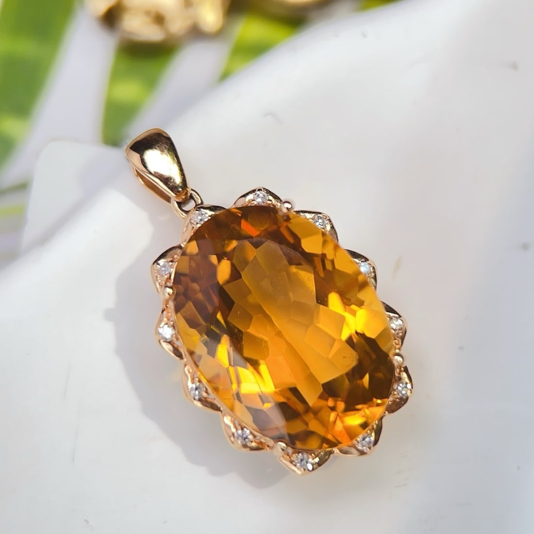 14k Gold 12.76 Ctw Natural Citrine & Diamond Pendant( Without Chain ): Ref:231194376 // gold content:14k gold // main gemstone:citrine // shape:oval // carat weight:12. 7ct // color:yellow // treatment:natural // // adjacent gemstone 2 : diamond // number of stones:12 //