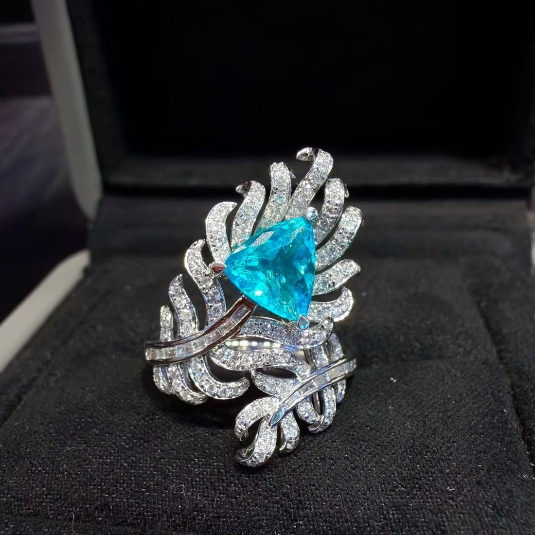 14k Gold 1.89 Ctw Natural Paraiba Tourmaline & Diamond Ring: Ref:231195017 // gold content:14k gold // ring size:7. 25us // // main gemstone:paraiba tourmaline // shape:triangle // carat weight:1. 29ct // color:blue // treatment:natural // // adjacent gemstone 