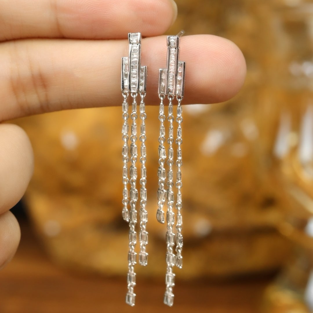 14k Gold 0.50 Ct Natural H Diamond Earrings: Ref:231195092 // gold content:14k gold // main gemstone:diamond // shape:baguette // carat weight:0. 50ct // clarity grade:vs-si // color:h // treatment:natural // Low Estimate: 1500 Condition: New Hi