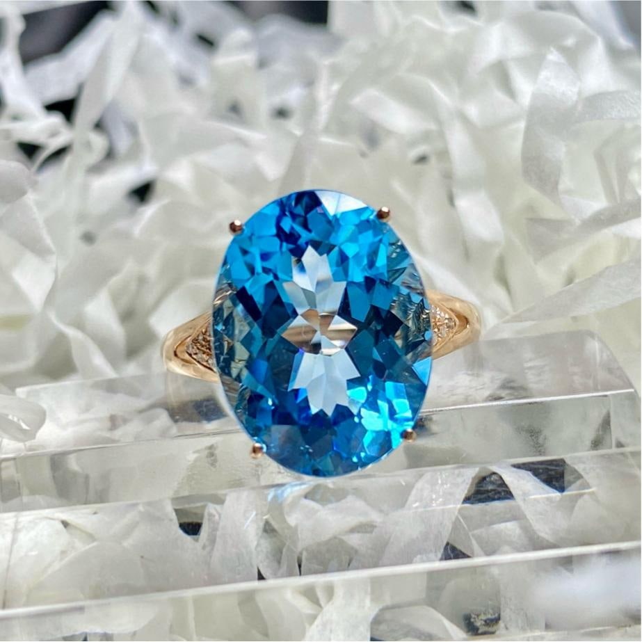 14k Gold 9.25 Ct Natural Topaz & Diamond Ring: Ref:231195096 // gold content:14k gold // ring size:7. 25us // // main gemstone:topaz // shape:oval // carat weight:9. 25ct // color:blue // treatment:natural // // adjacent gemstone 2 : diamond // nu