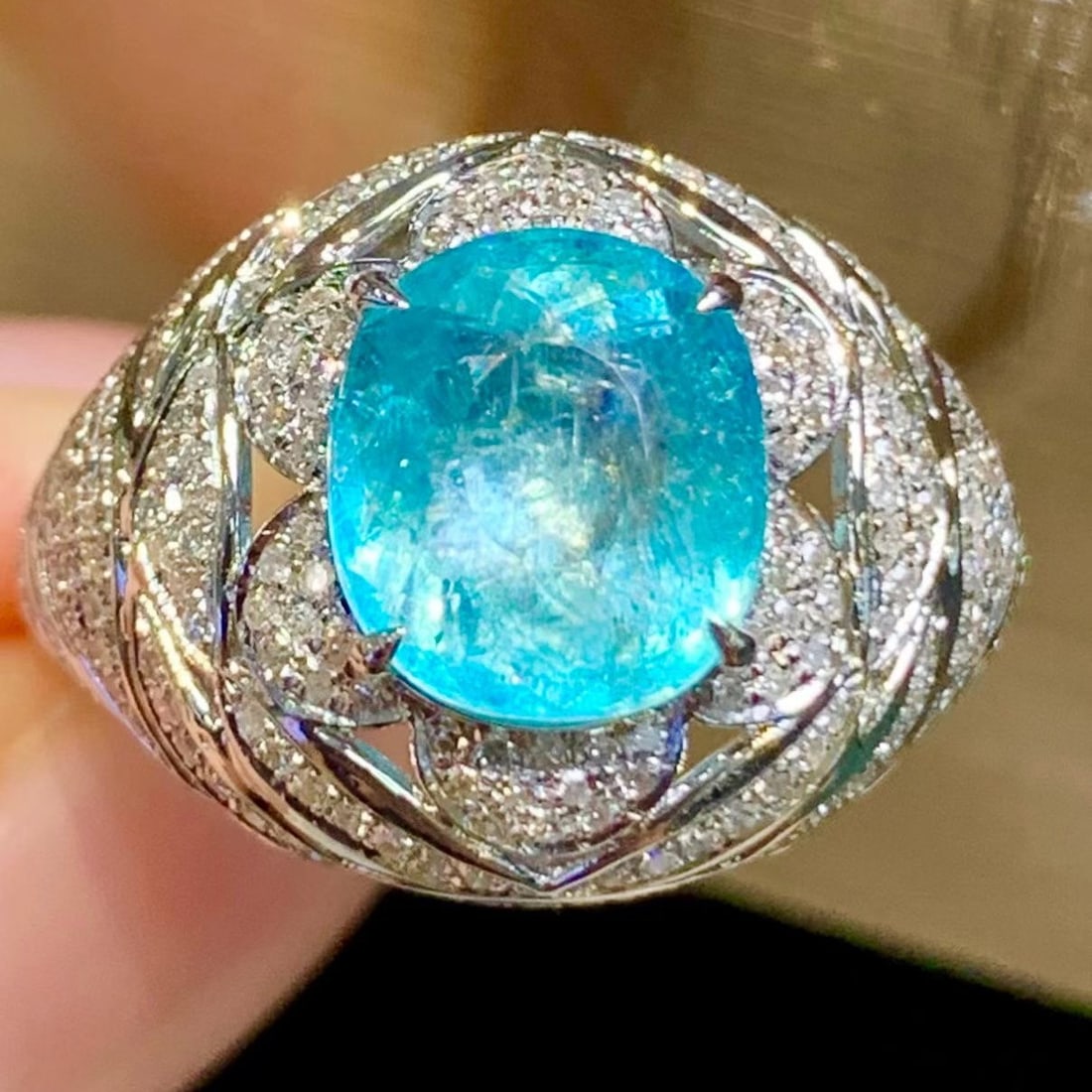 14k Gold 3 Ct Natural Paraiba Tourmaline & Diamond Ring: Ref:231195106 // gold content:14k gold // ring size:7. 25us // // main gemstone:paraiba tourmaline // shape:oval // carat weight:3ct // color:blue // treatment:natural // // adjacent gemstone 2 : diam