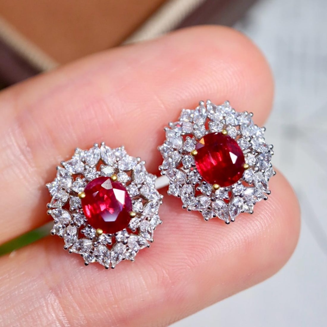 14k Gold 1.87 Ctw Natural Ruby & Diamond Earrings: Ref:231195121 // gold content:14k gold // main gemstone:ruby // shape:oval // carat weight:1. 05ct // color:red // treatment:natural // // adjacent gemstone 2 : diamond // shape:multiple // carat