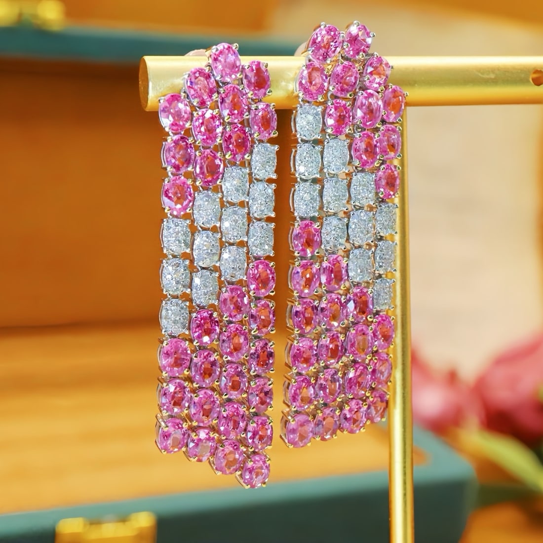 14k Gold 13.85 Ctw Natural Padparadscha Sapphire & Diamond Earrings: Ref:231195123 // gold content:14k gold // main gemstone:padparadscha sapphire // shape:oval // carat weight:13. 13ct // color:orangish pink // treatment:natural // // adjacent gemstone 2 : diamond // 