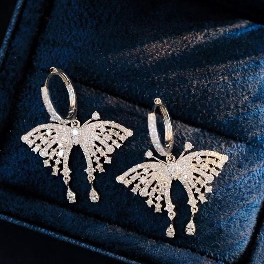 14k Gold 1.36 Ct Natural H Diamond & Butterfly Earrings: Ref:231195132 // gold content:14k gold // main gemstone:diamond // shape:multiple // carat weight:1. 36ct // clarity grade:vs-si // color:h // treatment:natural // Condition: New Low Estimate: 3100 Hi