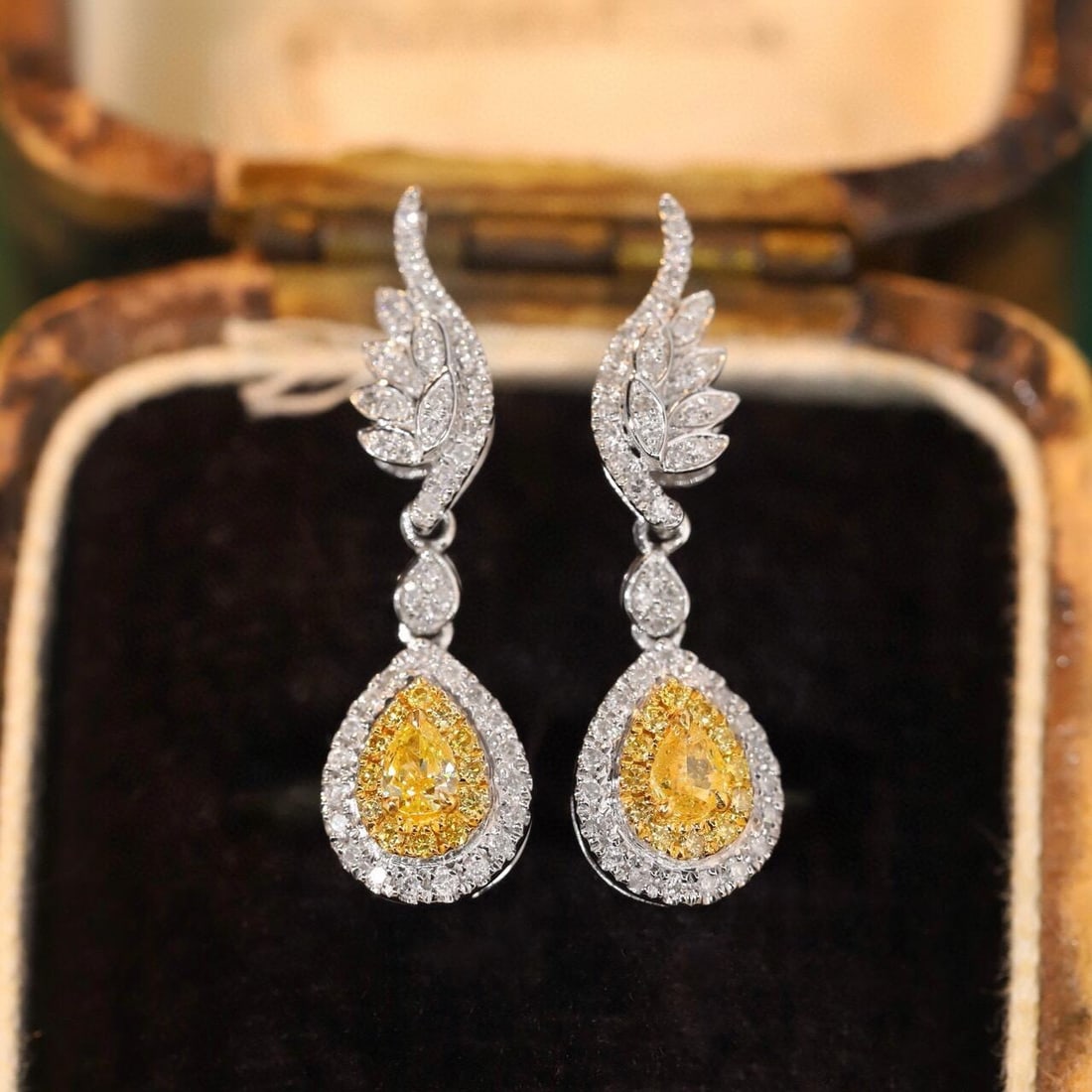 14k Gold 0.60 Ctw Natural Yellow Diamond & Diamond Earrings: Ref:231195136 // gold content:14k gold // main gemstone:yellow diamond // shape:pear // carat weight:0. 18ct // color:yellow // treatment:natural // // adjacent gemstone 2 : diamond // shape:round // 