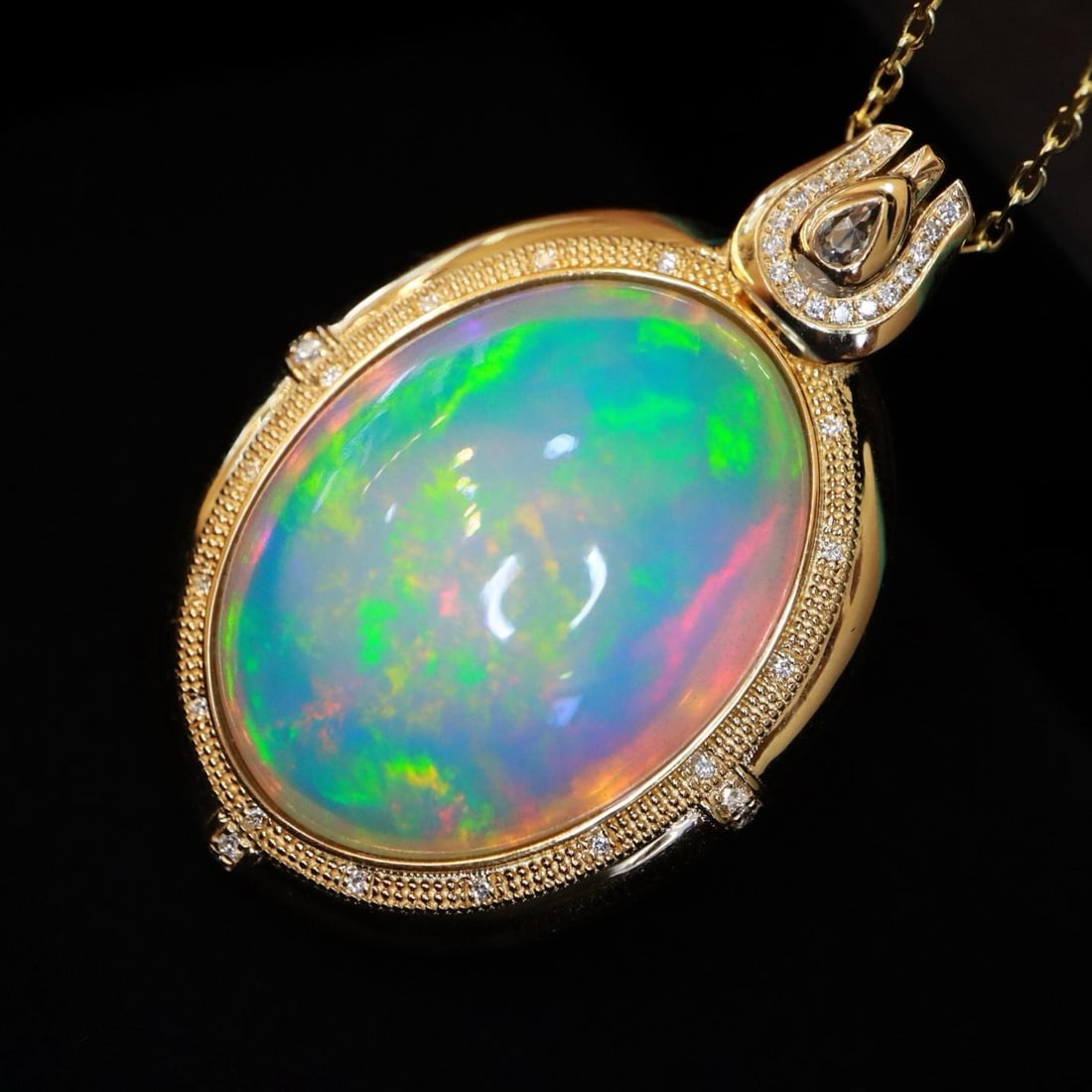 14k Gold 26.23 Ctw Natural Opal & Diamond Pendant( Without Chain ): Ref:231195260 // gold content:14k gold // main gemstone:opal // shape:oval // carat weight:26. 06ct // color:white // treatment:natural // // adjacent gemstone 2 : diamond // shape:round // carat weig