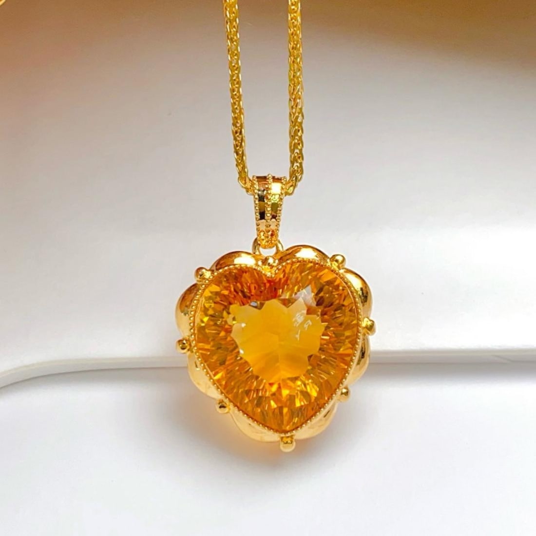 14k Gold 8.80 Ct Natural Citrine Pendant( Without Chain ): Ref:231196023 // gold content:14k gold // main gemstone:citrine // shape:heart // carat weight:8. 80ct // color:yellow // treatment:natural // High Estimate: 3000 Condition: New Low Estimate: 2000