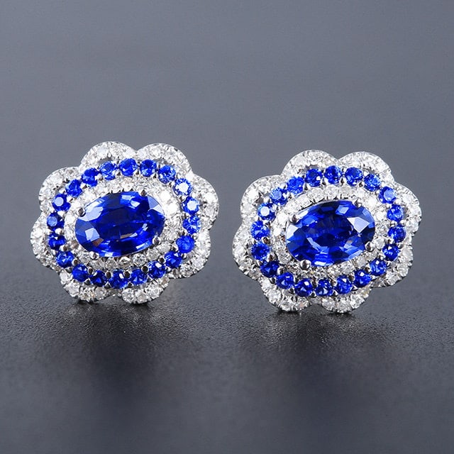 14k Gold 1.50 Ctw Natural Sapphire & Sapphire Earrings: Ref:231196032 // gold content:14k gold // main gemstone:sapphire // shape:oval // carat weight:1. 09ct // color:blue // treatment:natural // // adjacent gemstone 2 : sapphire // shape:round // carat w