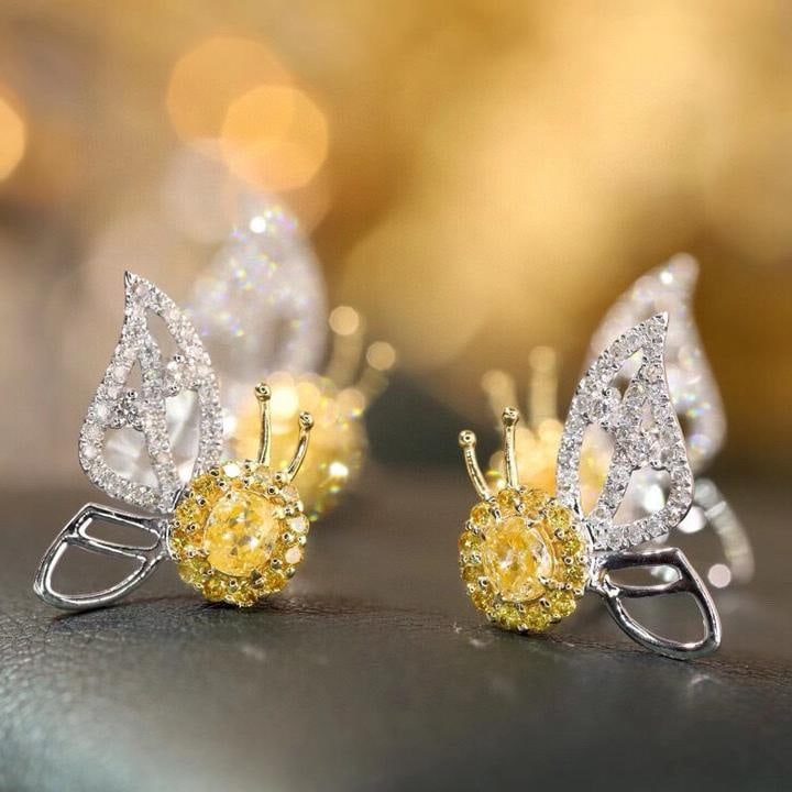 14k Gold 0.70 Ctw Natural Yellow Diamond & Diamond & Butterfly Earrings: Ref:231196084 // gold content:14k gold // main gemstone:yellow diamond // shape:oval // carat weight:0. 36ct // color:yellow // treatment:natural // // adjacent gemstone 2 : diamond // shape:round // 