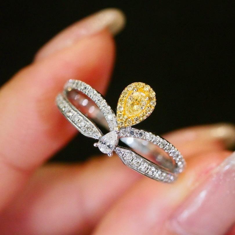 14k Gold 0.45 Ctw Natural Yellow Diamond & Diamond Ring: Ref:231196173 // gold content:14k gold // ring size:7. 25us // // main gemstone:yellow diamond // shape:pear // carat weight:0. 15ct // color:yellow // treatment:natural // // adjacent gemstone 2 : di