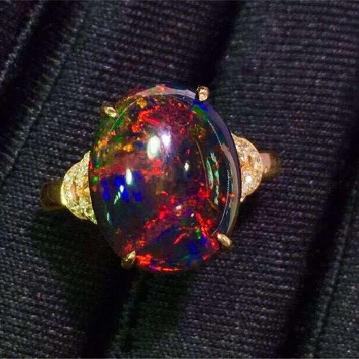 14k Gold 6.2 Ct Natural Opal & Diamond Ring: Ref:231196209 // gold content:14k gold // ring size:7. 25us // // main gemstone:opal // shape:oval // carat weight:6. 2ct // color:color // treatment:natural // // adjacent gemstone 2 : diamond // sha