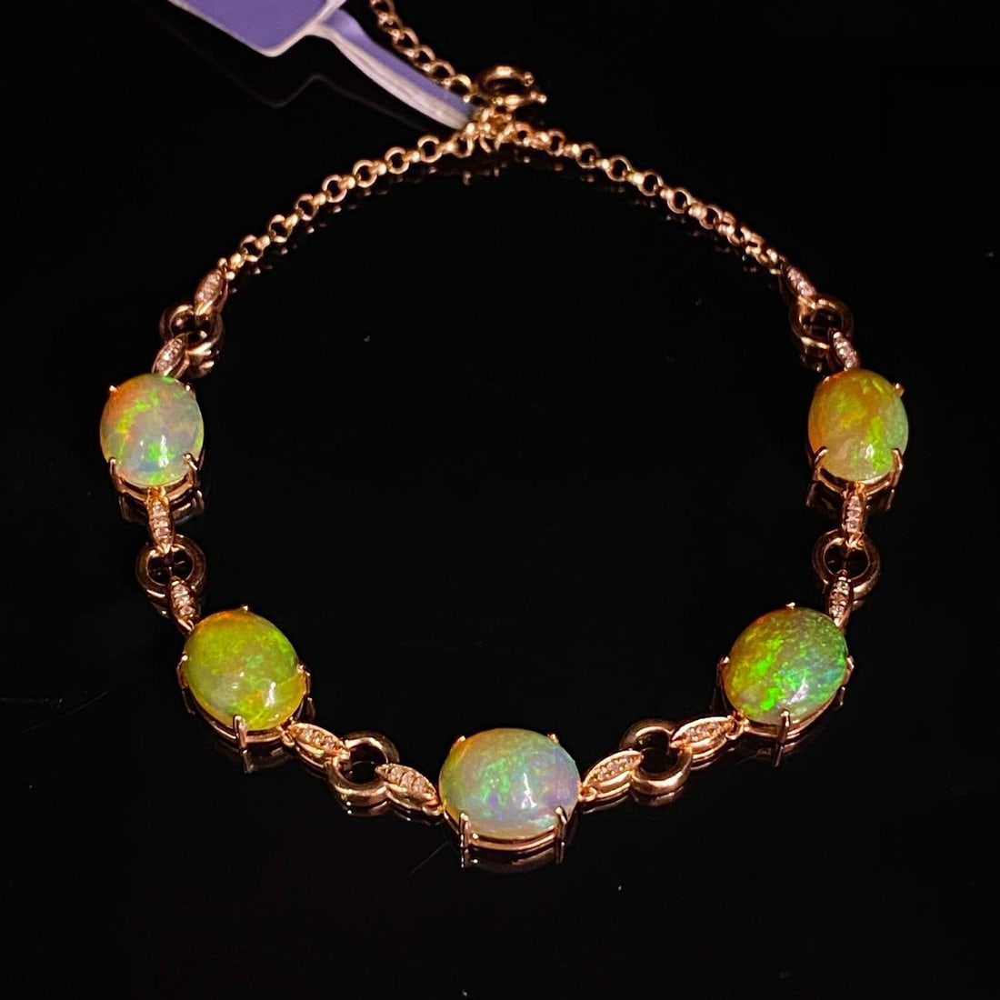 14k Gold 6.05 Ct Natural Opal & Diamond Bracelet: Ref:231196287 // gold content:14k gold // main gemstone:opal // shape:oval // carat weight:6. 05ct // color:white // treatment:natural // // adjacent gemstone 2 : diamond // number of stones:36 // sha