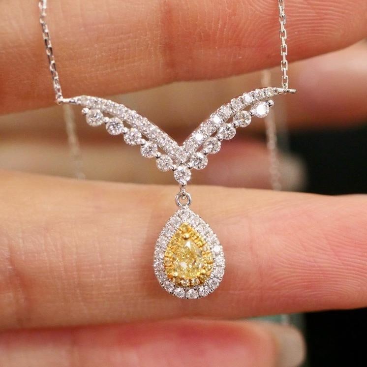 14k Gold 0.58 Ctw Natural Yellow Diamond & Diamond Necklace: Ref:231196248 // gold content:14k gold // main gemstone:yellow diamond // shape:pear // carat weight:0. 20ct // color:yellow // treatment:natural // // adjacent gemstone 2 : diamond // shape:round // 