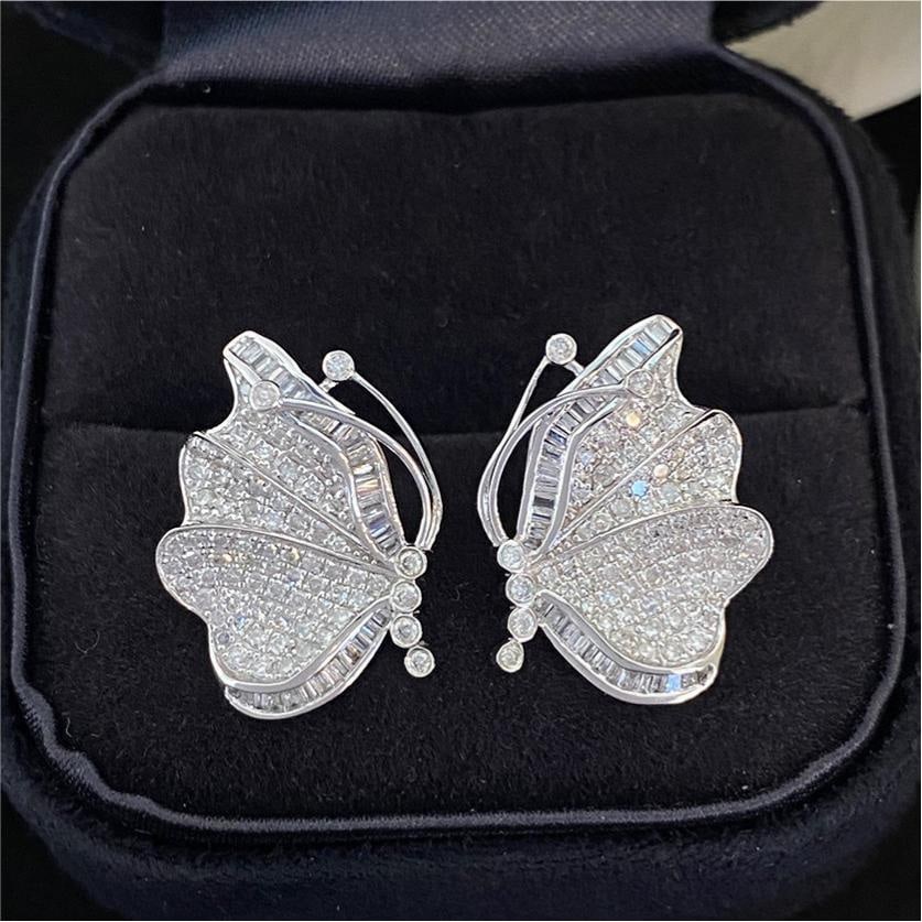 14k Gold 0.9 Ct Natural H Diamond & Butterfly Earrings: Ref:231196291 // gold content:14k gold // main gemstone:diamond // shape:multiple // carat weight:0. 9ct // clarity grade:vs-si // color:h // treatment:natural // Condition: New Low Estimate: 3100 Hig