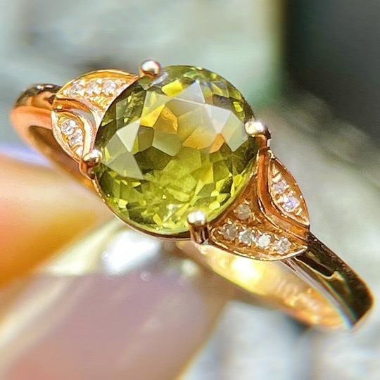 14k Gold 2.1 Ct Natural Tourmaline & Diamond Ring: Ref:231196260 // gold content:14k gold // ring size:7. 25us // // main gemstone:tourmaline // shape:oval // carat weight:2. 1ct // color:green // treatment:natural // // adjacent gemstone 2 : diamond 