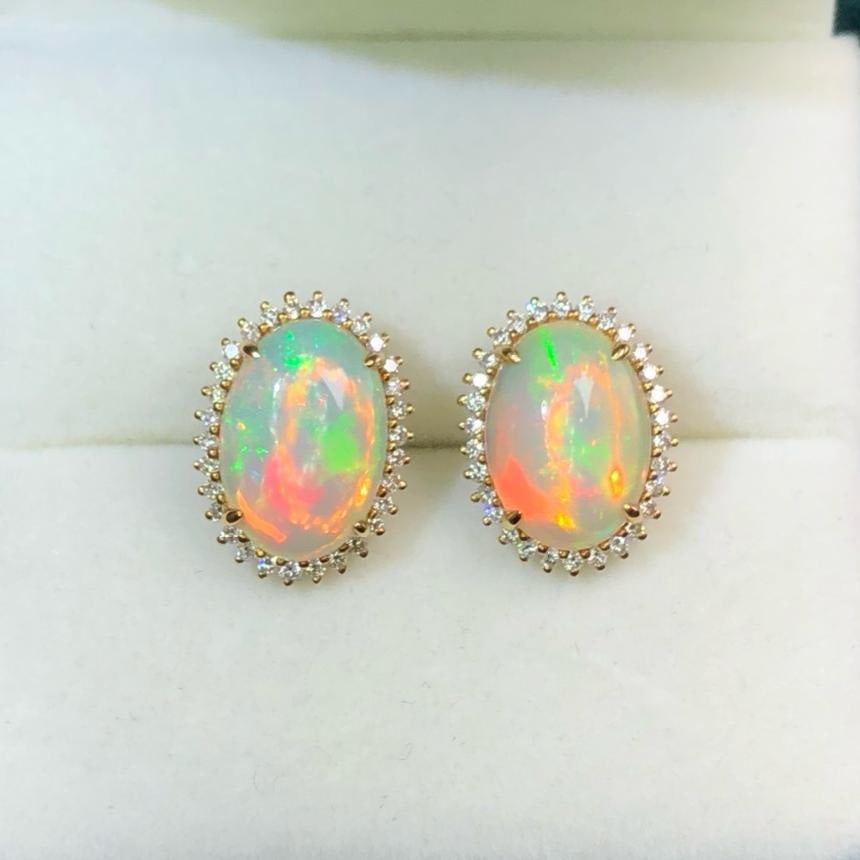 14k Gold 3.0 Ct Natural Opal & Diamond Earrings: Ref:231196286 // gold content:14k gold // main gemstone:opal // shape:oval // carat weight:3. 0ct // color:white // treatment:natural // // adjacent gemstone 2 : diamond // shape:round // clarity grad