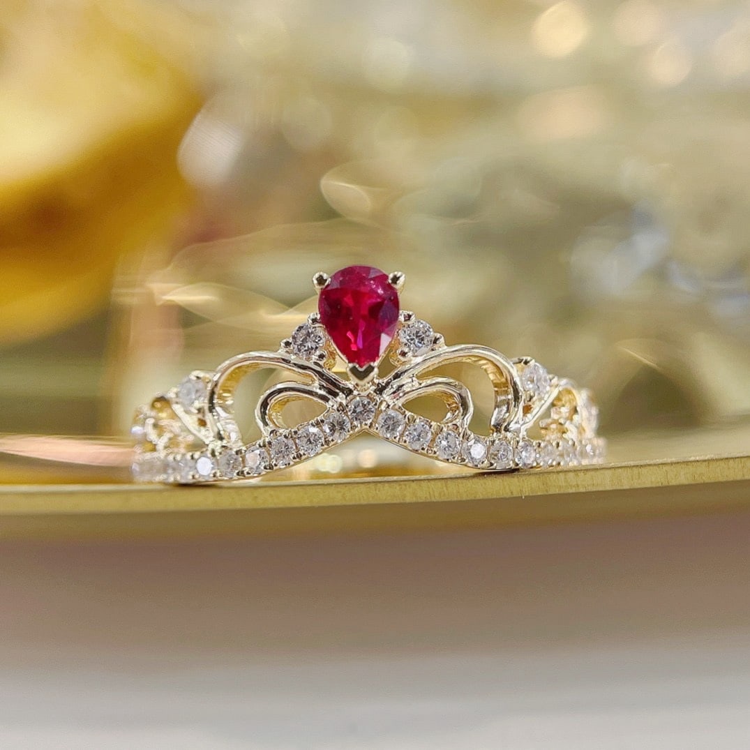 14k Gold 0.34 Ctw Natural Ruby & Diamond Ring: Ref:231196298 // gold content:14k gold // ring size:7. 25us // // main gemstone:ruby // shape:pear // carat weight:0. 16ct // color:red // treatment:natural // // adjacent gemstone 2 : diamond // shap