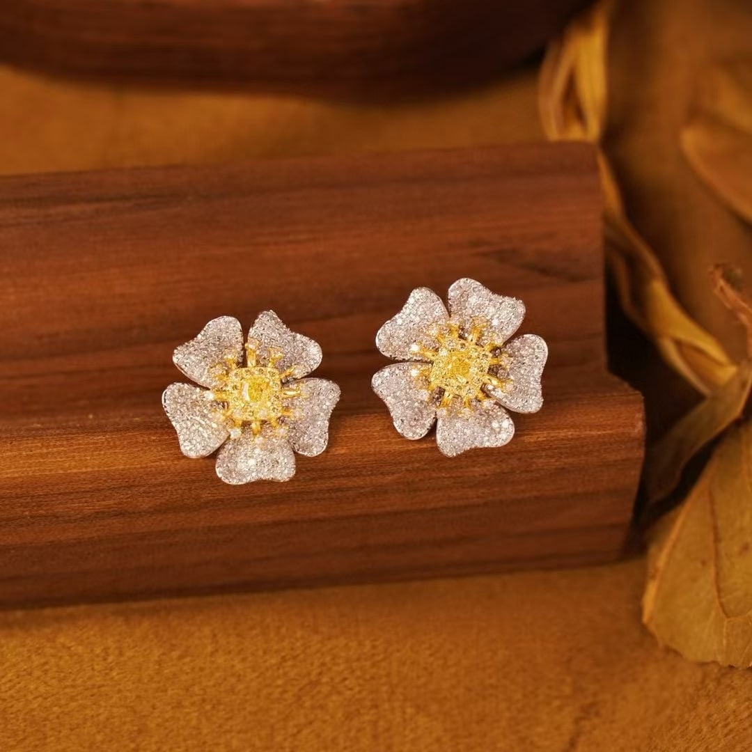 14k Gold 1.1 Ct Natural Color Diamond & Flowers Earrings: Ref:231196339 // gold content:14k gold // main gemstone:diamond // shape:multiple // carat weight:1. 1ct // clarity grade:vs-si // color:color // treatment:natural // Condition: New Low Estimate: