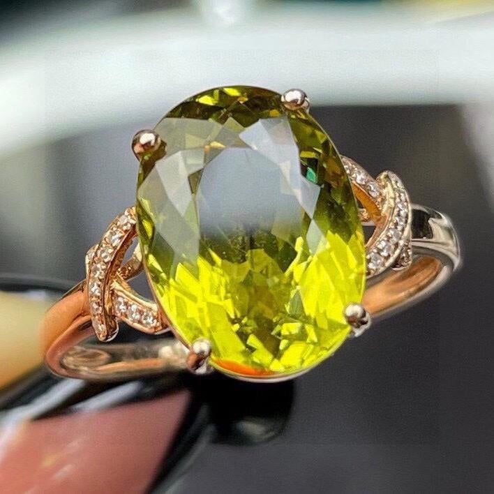 14k Gold 5.65 Ct Natural Tourmaline & Diamond Ring: Ref:231196304 // gold content:14k gold // ring size:7. 25us // // main gemstone:tourmaline // shape:oval // carat weight:5. 65ct // color:green // treatment:natural // // adjacent gemstone 2 :