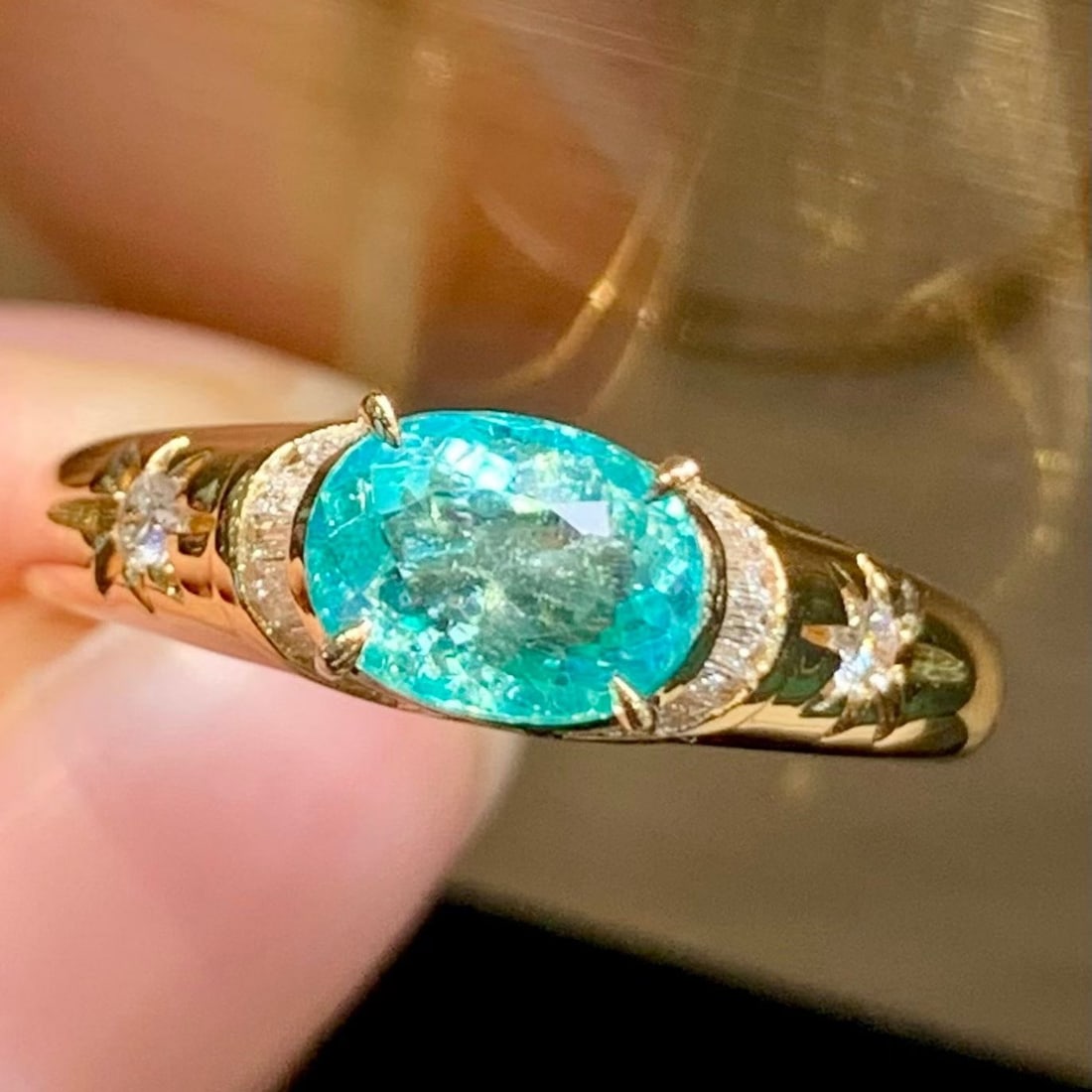 14k Gold 1.1 Ct Natural Paraiba Tourmaline & Diamond Ring: Ref:231196356 // gold content:14k gold // ring size:7. 25us // // main gemstone:paraiba tourmaline // shape:oval // carat weight:1. 1ct // color:blue // treatment:natural // // adjacent gemstone 2 : d