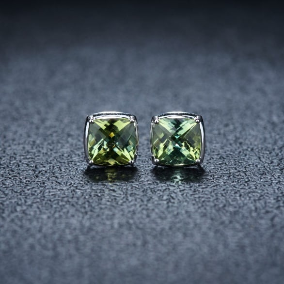 14k Gold 3.12 Ct Natural Tourmaline Earrings: Ref:231196429 // gold content:14k gold // main gemstone:tourmaline // shape:cushion // carat weight:3. 12ct // color:green // treatment:natural // Condition: New Low Estimate: 1800.00 High Estimate: 2