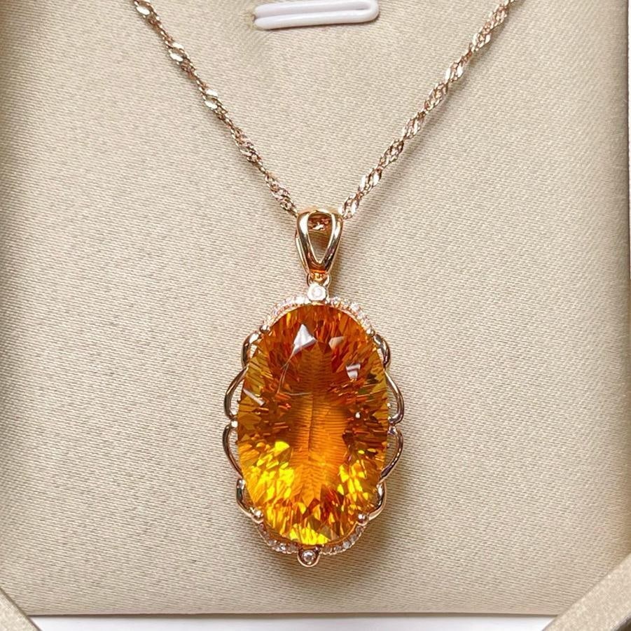 14k Gold 19.02 Ctw Natural Citrine & Diamond Pendant( Without Chain ): Ref:231196443 // gold content:14k gold // main gemstone:citrine // shape:oval // carat weight:18. 95ct // color:yellow // treatment:natural // // adjacent gemstone 2 : diamond // number of stones:22 /