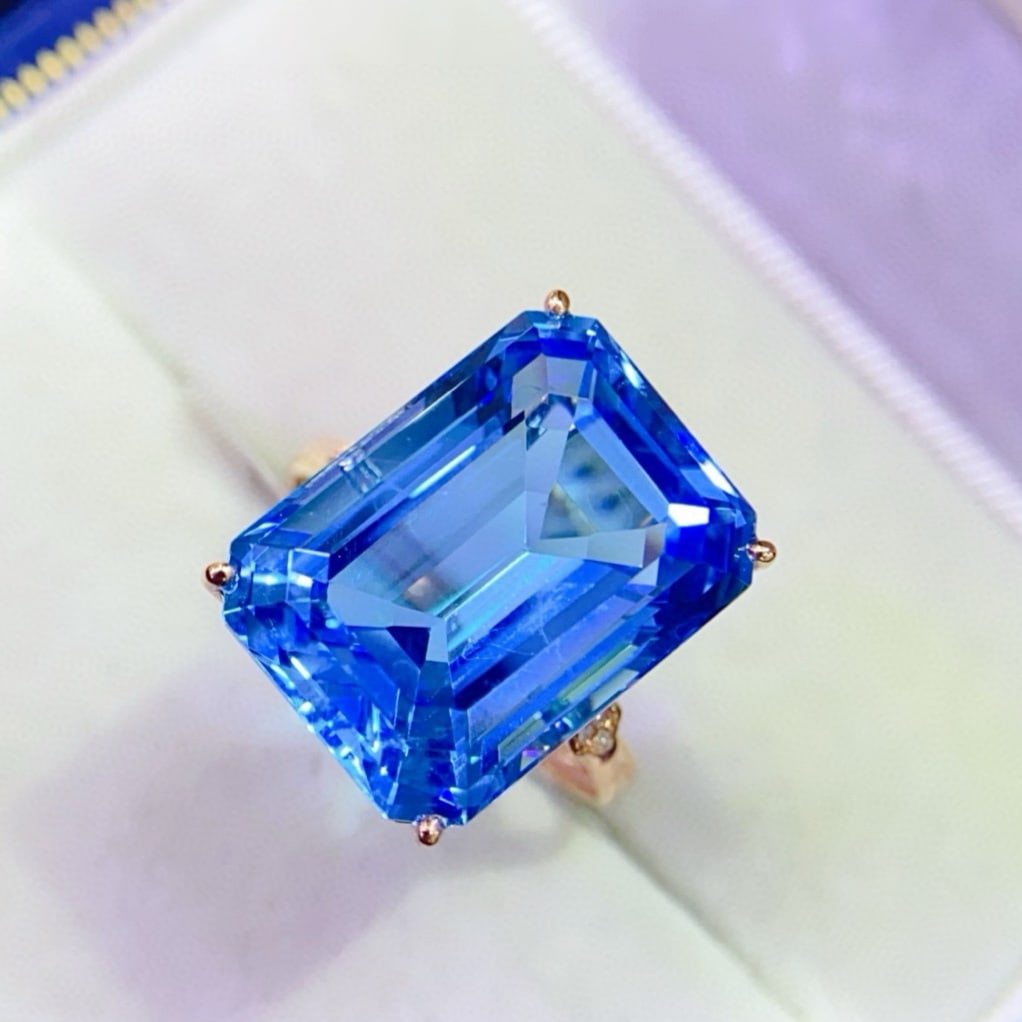 14k Gold 15.42 Ctw Natural Topaz & Diamond Ring: Ref:231173055 // gold content:14k gold // ring size:7. 25us // // main gemstone:topaz // shape:octagonal // carat weight:15. 4ct // color:blue // treatment:natural // // adjacent gemstone 2 : diamond