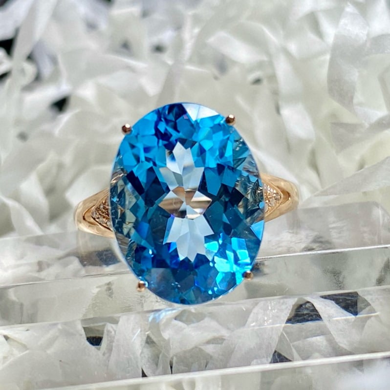 14k Gold 9.25 Ct Natural Topaz & Diamond Ring: Ref:231173057 // gold content:14k gold // ring size:7. 25us // // main gemstone:topaz // shape:oval // carat weight:9. 25ct // color:blue // treatment:natural // // adjacent gemstone 2 : diamond //