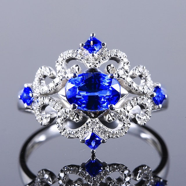 14k Gold 1.38 Ctw Natural Sapphire & Diamond Ring: Ref:231173085 // gold content:14k gold // ring size:7. 25us // // main gemstone:sapphire // shape:oval // carat weight:1. 18ct // color:blue // treatment:natural // // adjacent gemstone 2 : diamond