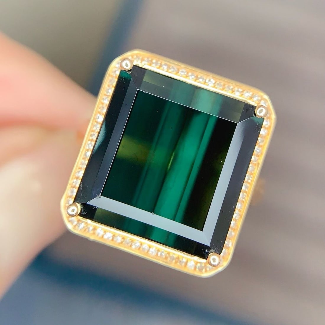 14k Gold 7.8 Ct Natural Tourmaline & Diamond Ring: Ref:231173114 // gold content:14k gold // ring size:7. 25us // // main gemstone:tourmaline // shape:octagonal // carat weight:7. 8ct // color:green // treatment:natural // // adjacent gemstone 2 : dia