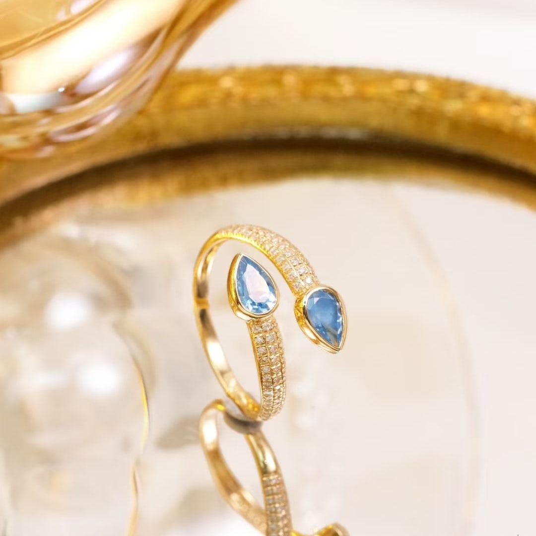14k Gold 1.04 Ctw Natural Aquamarine & Diamond Ring: Ref:231173132 // gold content:14k gold // ring size:7. 25us // // main gemstone:aquamarine // shape:pear // carat weight:0. 8ct // color:blue // treatment:natural // // adjacent gemstone 2 : diamond